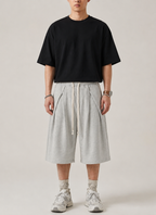 Relaxed Pleated Fleece Shorts
