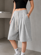 Relaxed Pleated Fleece Shorts